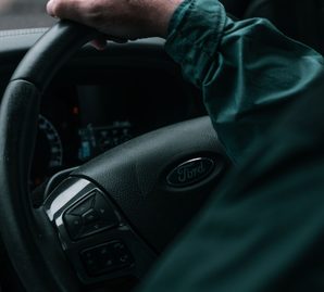 Learner's hands on the steering wheel
